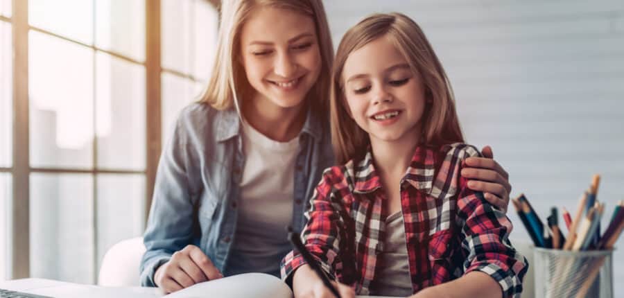 Homeschooling Tutor Helping Homeschool Student