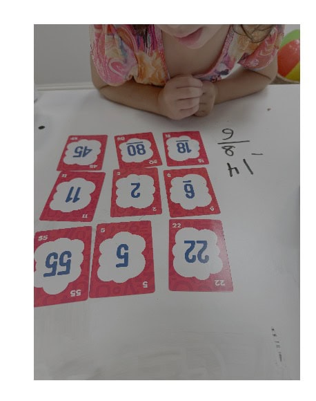 Child playing Proof math game